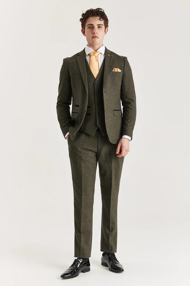 Oscar wedding suit in green by Paul Andrew, to buy at Isobels